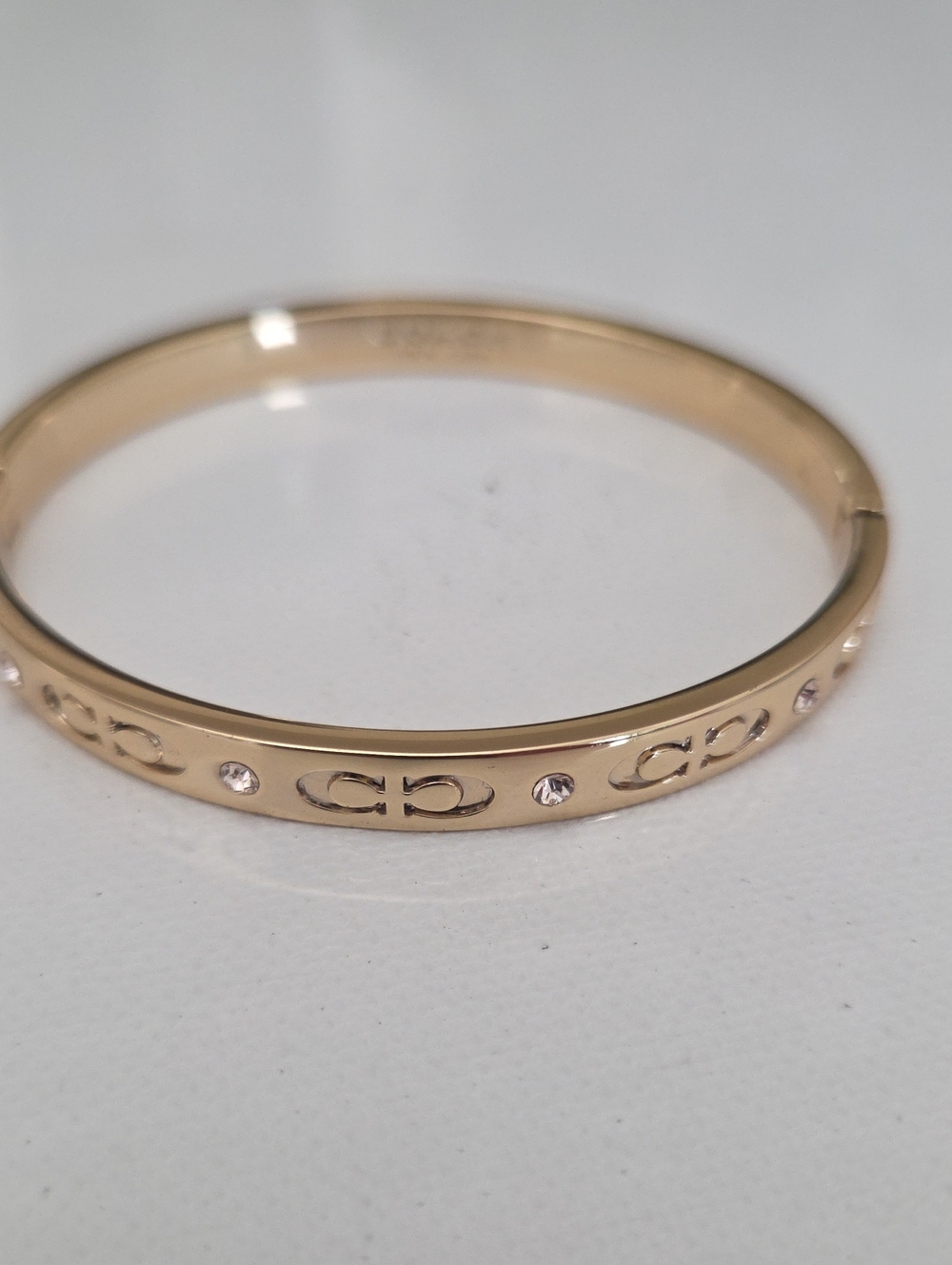 Coach Gold-Tone Logo Crystal Hinged Bangle Bracelet